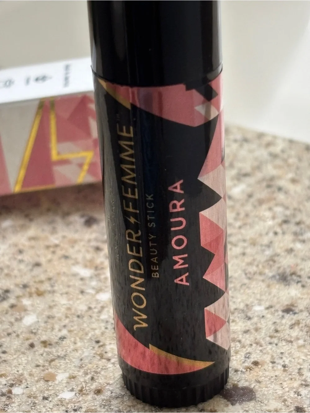 Amoura Beauty Stick in Shimmery Coral Pink